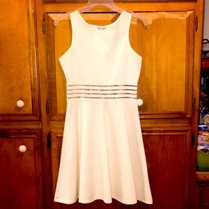 Pretty white/cream colored dress.